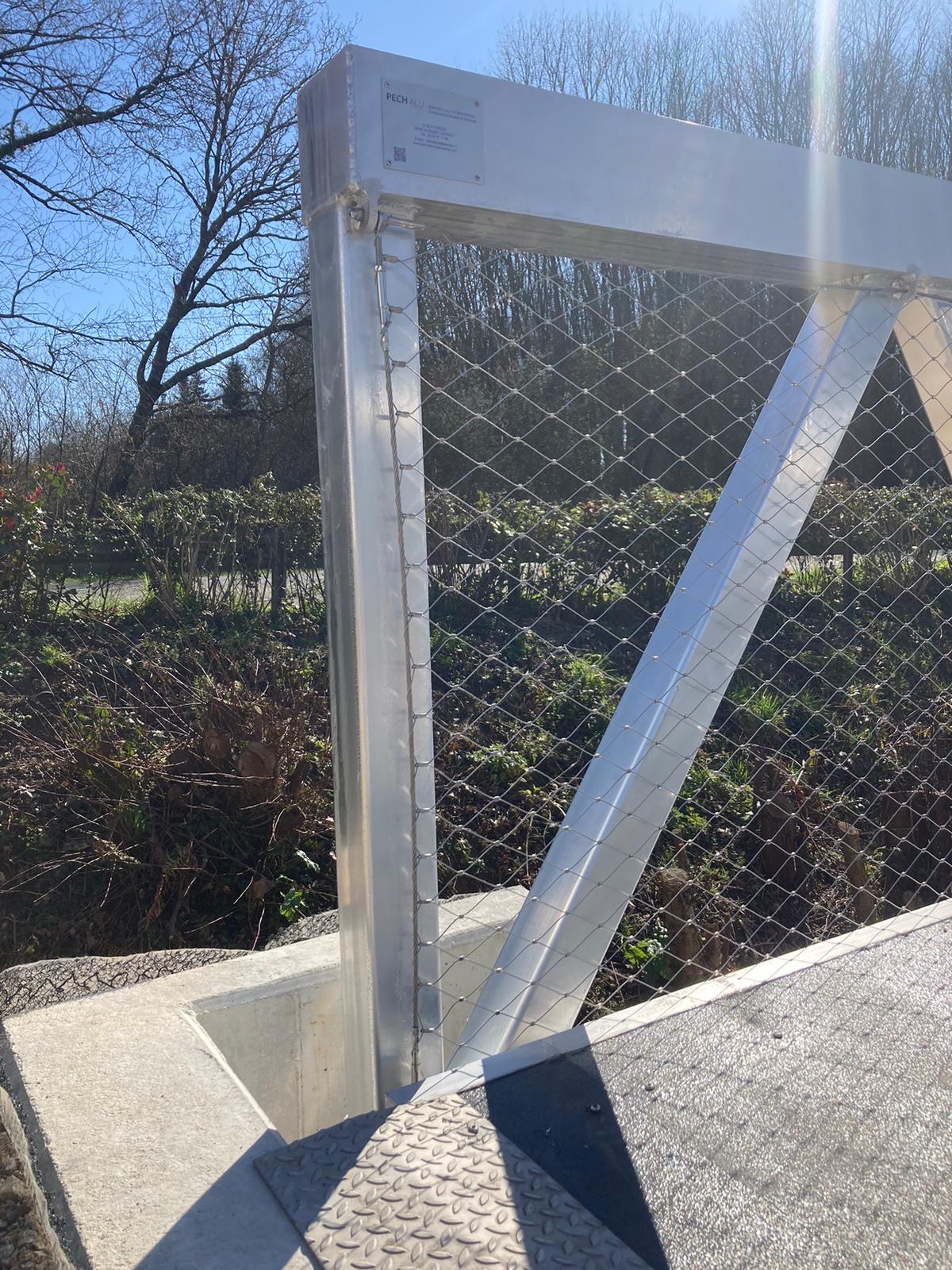 Garde-corps par remplissage filets inox (passerelle 1)